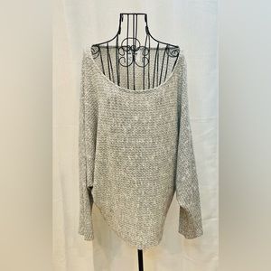 Grey and white dolman sleeve top.